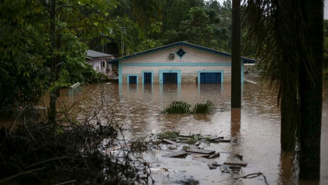 A flooded house is seen in the surroundings of the ERS-122 highway, flooded by heavy rains, at the Sao Sebastiao do Cai, Rio Grande do Sul state, Brazil on May 2, 2024.