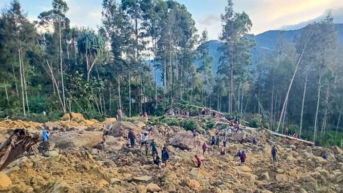 A general view shows the site of a landslide in Maip Mulitaka in Papua New Guinea's Enga Province on May 24, 2024. Local officials and aid groups said a massive landslide struck a village in Papua New Guinea's highlands on May 24, with many feared dead.