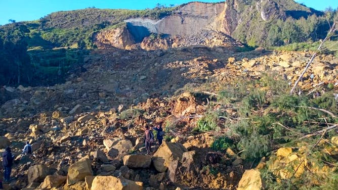 A general view shows the site of a landslide in Maip Mulitaka in Papua New Guinea's Enga Province on May 24, 2024. Local officials and aid groups said a massive landslide struck a village in Papua New Guinea's highlands on May 24, with many feared dead.