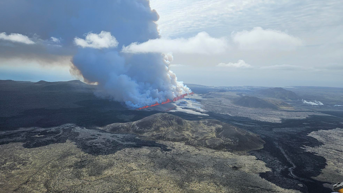 This image shows lava coming from a fissure that opened during a volcanic eruption near Grindavik in Iceland on Wednesday, May 29, 2024.