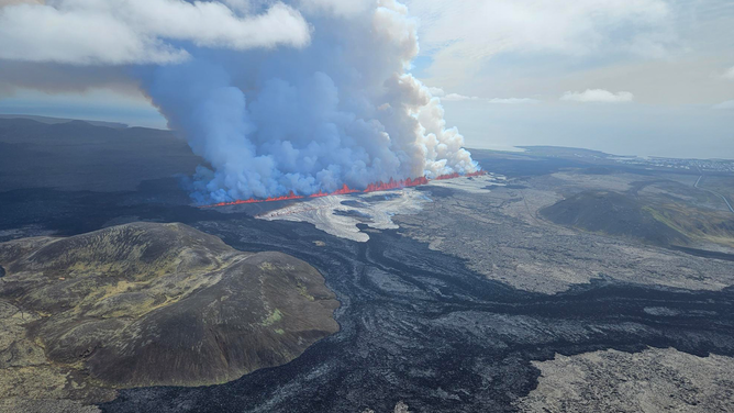 This image shows lava coming from a fissure that opened during a volcanic eruption near Grindavik in Iceland on Wednesday, May 29, 2024.