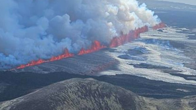 This image shows lava coming from a fissure that opened during a volcanic eruption near Grindavik in Iceland on Wednesday, May 29, 2024.