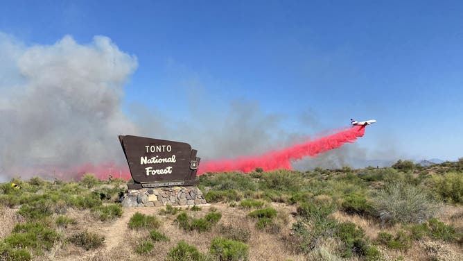 This image shows a retardant drop during initial attack in Tonto National Forest, Saturday, May 18, 2024