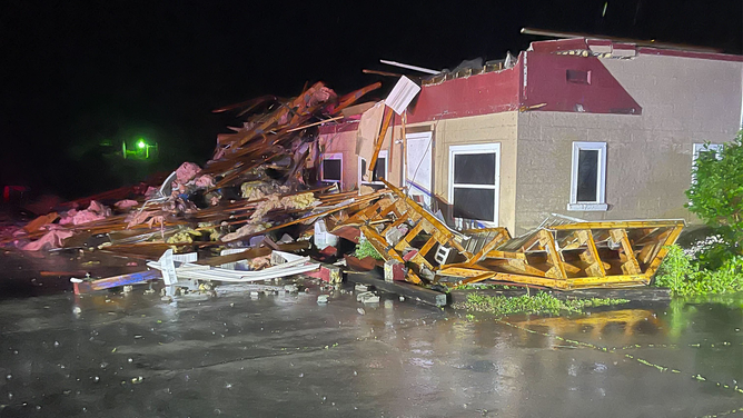 A building received significant damage during a possible tornado in Sullivan, Missouri, on Tuesday, May 7, 2024.