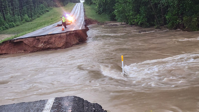 This image shows a road that was washed away by raging floodwaters in Walker County, Texas, on Thursday, May 2, 2024.