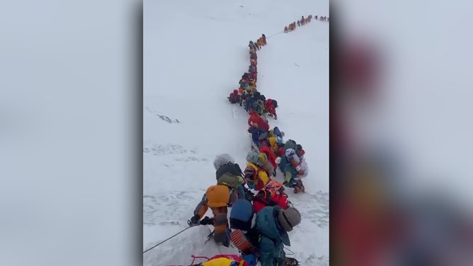 Climber line atop Mt. Everest
