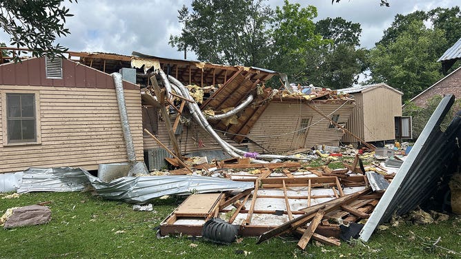 Damage to a building in Henderson, Louisiana, is seen May 14, 2024, after a tornado hit the area the day before.
