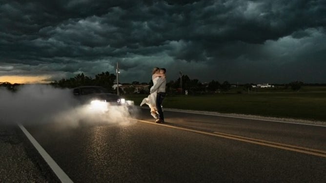 Newlyweds Trapper and MaKayla Shore took epic wedding photos as a thunderstorm approached.