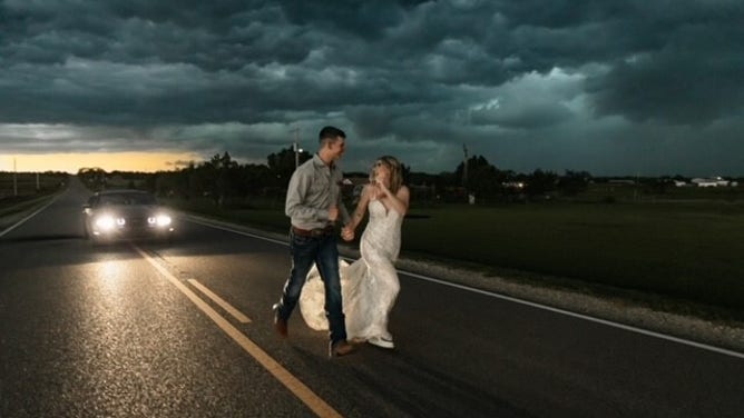 Newlyweds Trapper and MaKayla Shore took epic wedding photos as a thunderstorm approached.