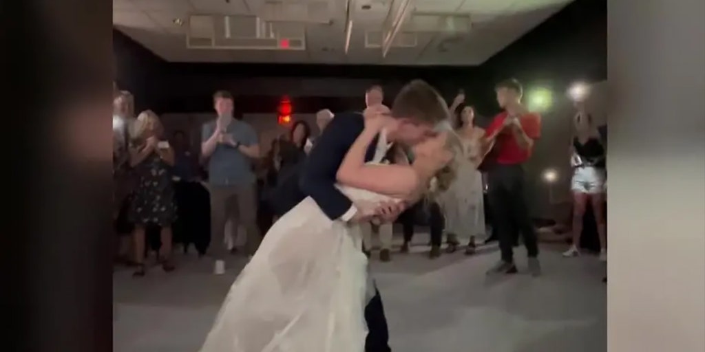 Tornado warning forces Wisconsin wedding party to join another family's reunion