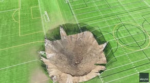 Videos capture giant sinkhole opening up in middle of Illinois soccer field