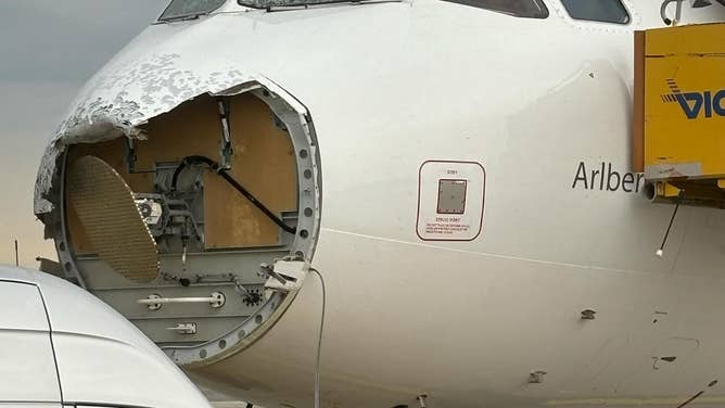 Photos show damage to the Austrian Airlines Airbus A320 plane after flying through a thunderstorm on Sunday, June 9, 2024.