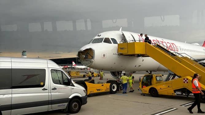 Photos show damage to the Austrian Airlines Airbus A320 plane after flying through a thunderstorm on Sunday, June 9, 2024.