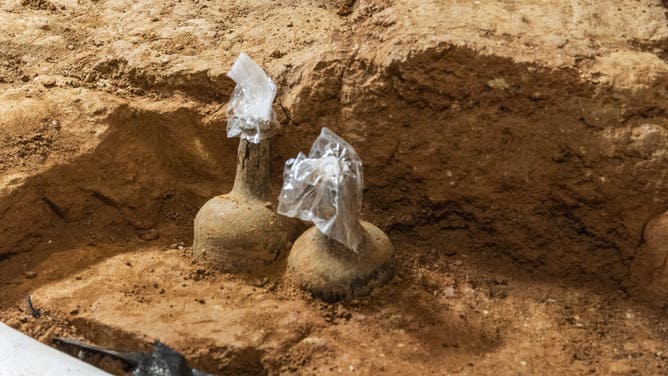 Archaeologists at George Washington’s Mount Vernon have unearthed 37 glass bottles from the 18th century in five storage pits in the Mansion cellar of the nation’s first president.