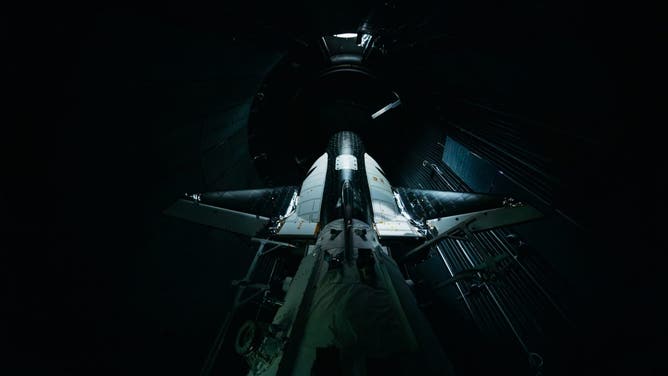 Dream Chaser Tenacity and its Shooting Star cargo companion are shown stacked inside a thermal vacuum test chamber at NASA’s Neil Armstrong Test Facility on April 26, 2024. 