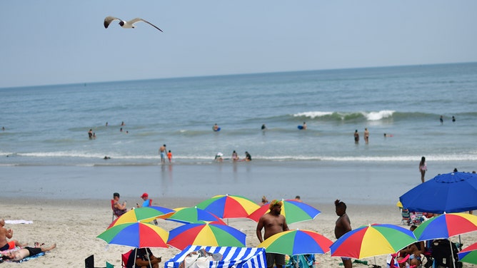 People visit the beach on July 3, 2020 in Atlantic City, New Jersey.