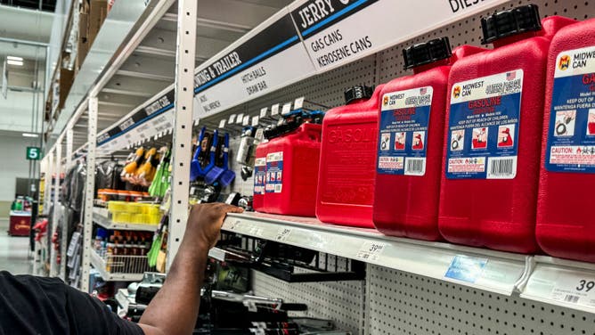People shop for jerry cans at a hardware store as they prepare for the arrival of Hurricane Beryl in Bridgetown, Barbados on June 30, 2024.