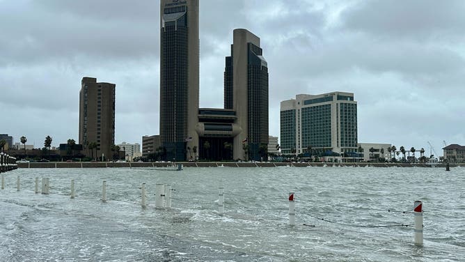Storm surge flooding is seen against the skyline of Corpus Christi, Texas, during Tropical Storm Alberto on June 19, 2024.