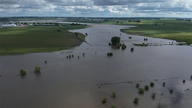 The Floyd River in Sheldon, Iowa, is seen overflowing its banks.
