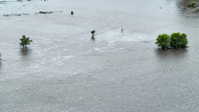 The Floyd River in Sheldon, Iowa, is seen overflowing its banks.