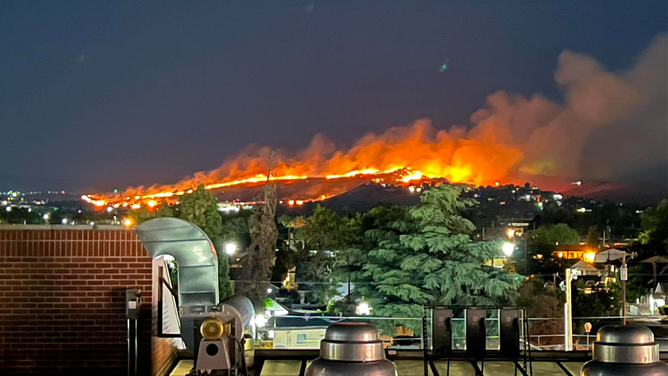 This photo shows the large fire burning in the community of Sparks in Nevada outside Reno on Tuesday, June 11, 2024.