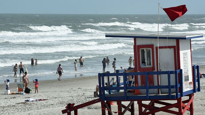 A high-hazard red flag is flown at a lifeguard tower at Cocoa Beach, Florida, on Sept. 14, 2019.