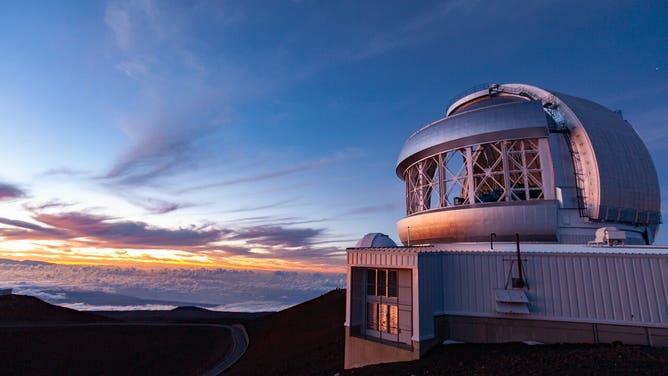 The Gemini North telescope on Maunakea in Hawaii on a rare cloudy evening as the telescope prepares for nighttime operations.