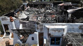 Photos show charred remnants of Riverside neighborhood after firework sparks massive wildfire in California