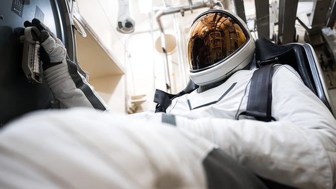A Polaris Dawn crew member during SpaceX EVA spacesuit acceptance testing at Johnson Space Center in Houston.