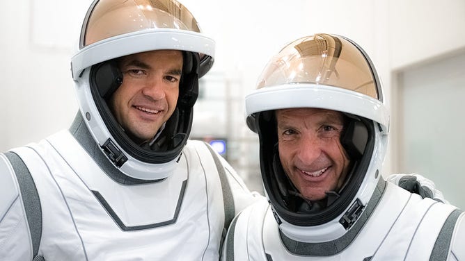 Jared Isaacman and Kidd Poteet during EVA suit acceptance testing at Johnson Space Center in Houston.