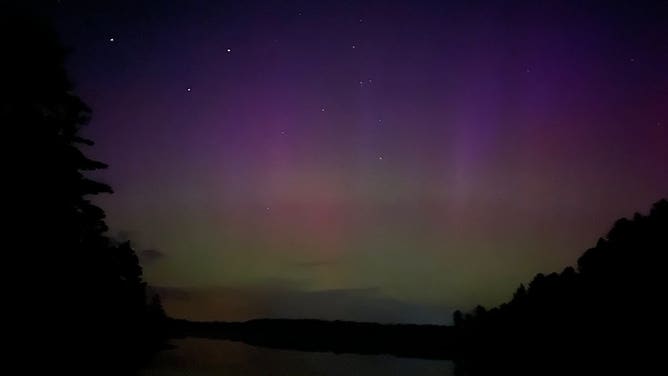 Photos taken with an iPhone 13 show aurora lights south of Sudbury, Ontario, Canada at Grundy Lake Provincial Park.