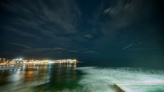 The night sky is illuminated by a meteor shower on July 28, 2022 in Sydney, Australia. 