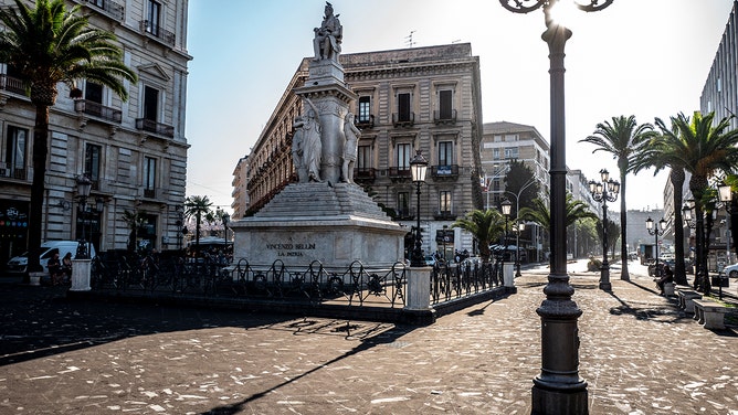 In square Stesicoro, with the monument to the musician Vincenzo Bellini, the layer of volcanic ash that has covered the city's streets and pavements has made it dangerous for vehicles and pedestrians to circulate on July 5, 2024 in Catania, Italy.