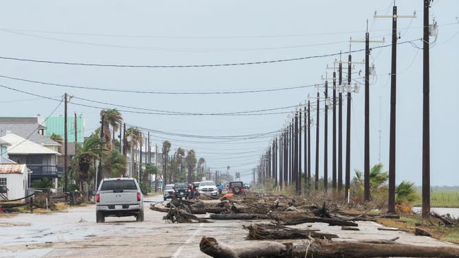 Debris blocks FM2031, the main access road, after Hurricane Beryl came ashore nearby Monday, July 8, 2024, in Matagorda.