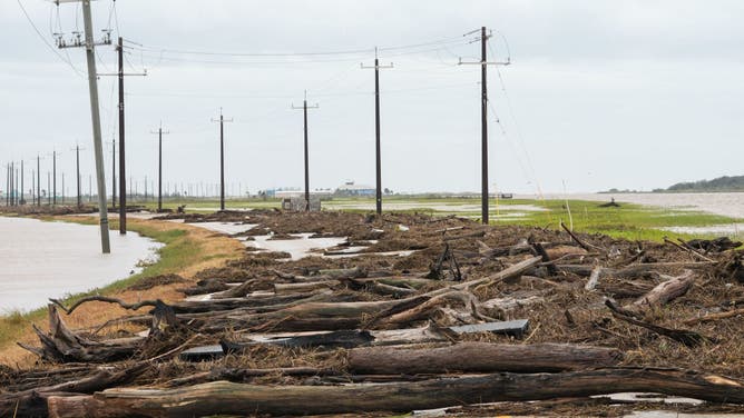 Debris blocks FM 2031, the main access road, after Hurricane Beryl came ashore nearby Monday, July 8, 2024, in Matagorda.