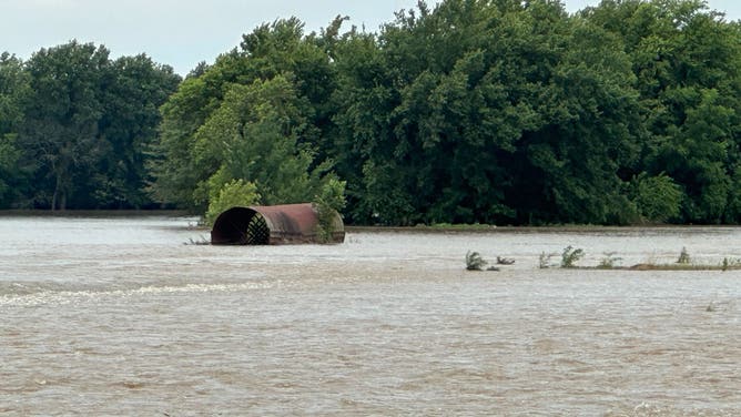 Flooding due to an imminent dam failure in Nashville, Illinois.