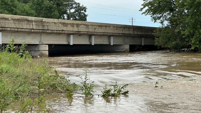 Flooding due to an imminent dam failure in Nashville, Illinois.