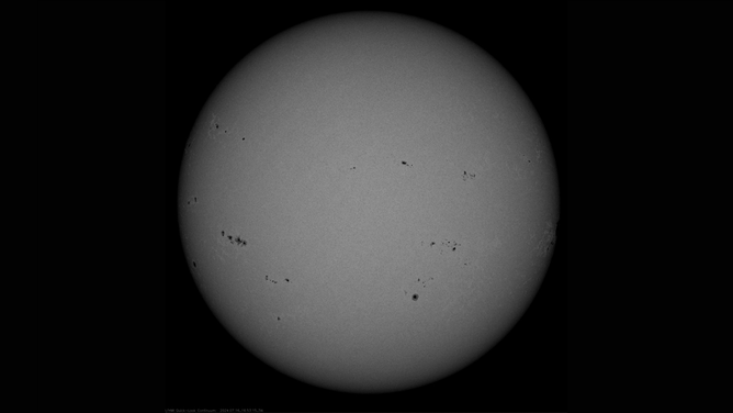 A NASA Solar Dynamics Observatory image showing multiple sunspot groups on July 16, 2024.