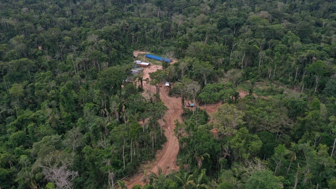 A photo shared by the indigenous rights group Survival International shows a logging camp near the Mashco Piro tribe in Peru.