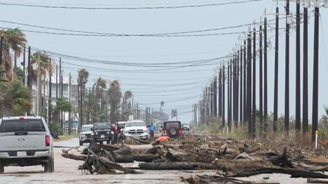 Debris blocks FM2031, the main access road, after Hurricane Beryl came ashore nearby Monday, July 8, 2024, in Matagorda.