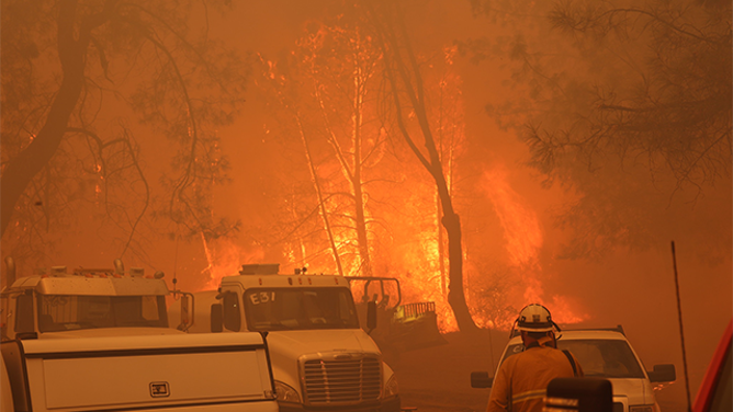 This image shows flames from California’s Park Fire burning near Chico devouring the landscape.