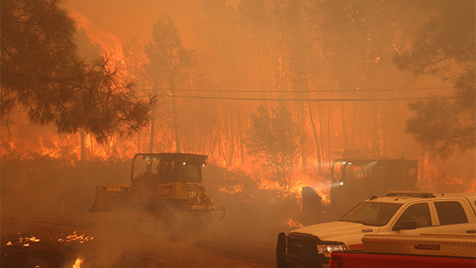 This image shows flames from California’s Park Fire burning near Chico devouring the landscape.