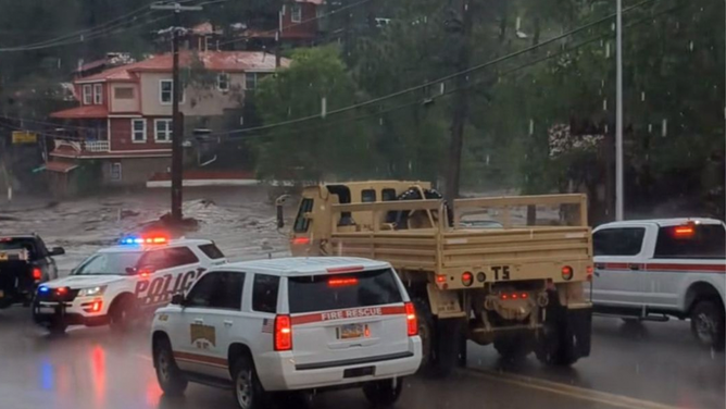 Flooding on July 20, 2024 in Ruidoso, New Mexico with National Guard on scene.