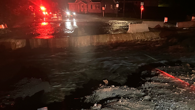 Portions of a road are seen washed away after catastrophic flooding in the St. Johnsbury, Vermont, area, on Tuesday, July 30, 2024.