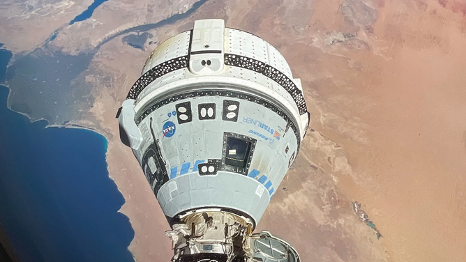 The Starliner spacecraft on NASA’s Boeing Crew Flight Test is pictured docked to the Harmony module’s forward port as the International Space Station orbited 262 miles above Egypt’s Mediterranean coast.