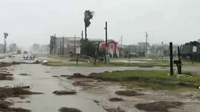 This image shows an RV on its side and debris in the road in Surfside Beach, Texas, after Hurricane Beryl made landfall on Monday, July 8, 2024.