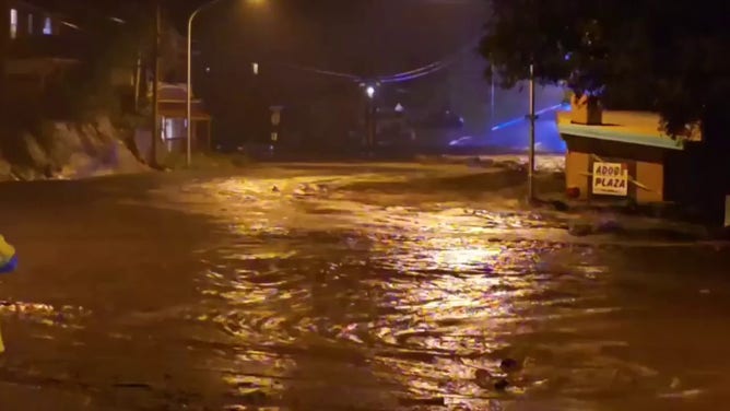 Floodwaters inundate Ruidoso, New Mexico during monsoon rains