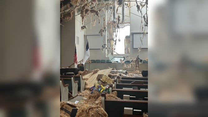 Photos from Mansfield, Louisiana showed damage from a tornado that hit the town on Monday. Several structures appeared to have damage and trees were knocked down onto roadways.