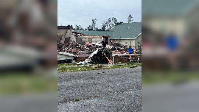 Photos from Mansfield, Louisiana showed damage from a tornado that hit the town on Monday. Several structures appeared to have damage and trees were knocked down onto roadways.