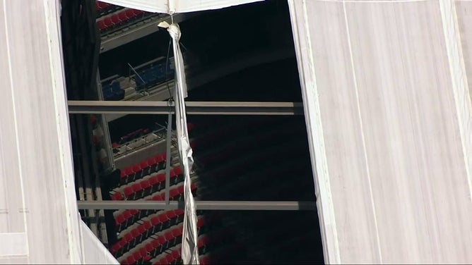 Damage to the roof at NRG Stadium in Houston, Texas after Hurricane Beryl.